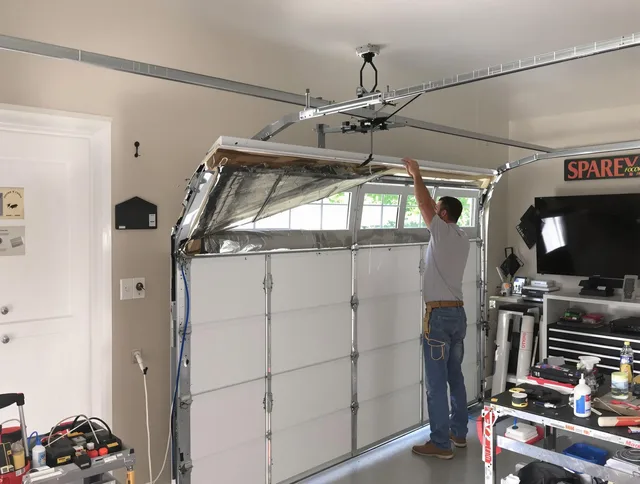 Garage door section replacement by Stonington Garage Door Repair in Stonington