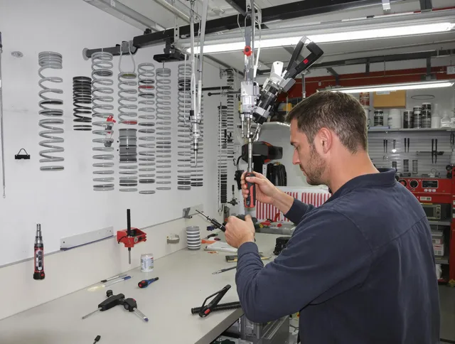 Stonington Garage Door Repair safety certified technician performing precision spring replacement in Stonington