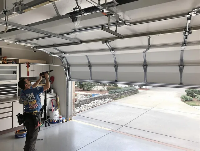 Garage door track repair service by Stonington Garage Door Repair in Stonington